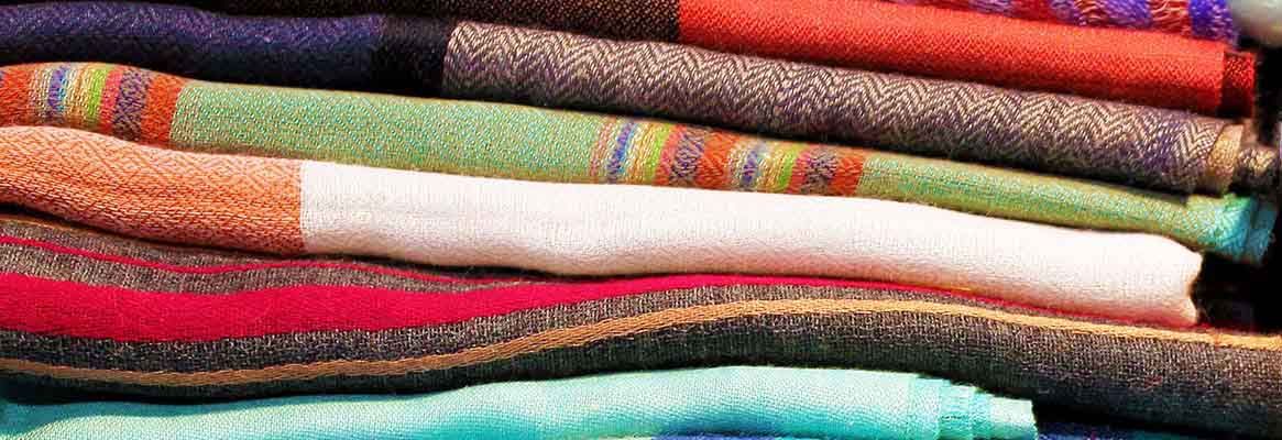 Identification of type of size in woven fabrics
