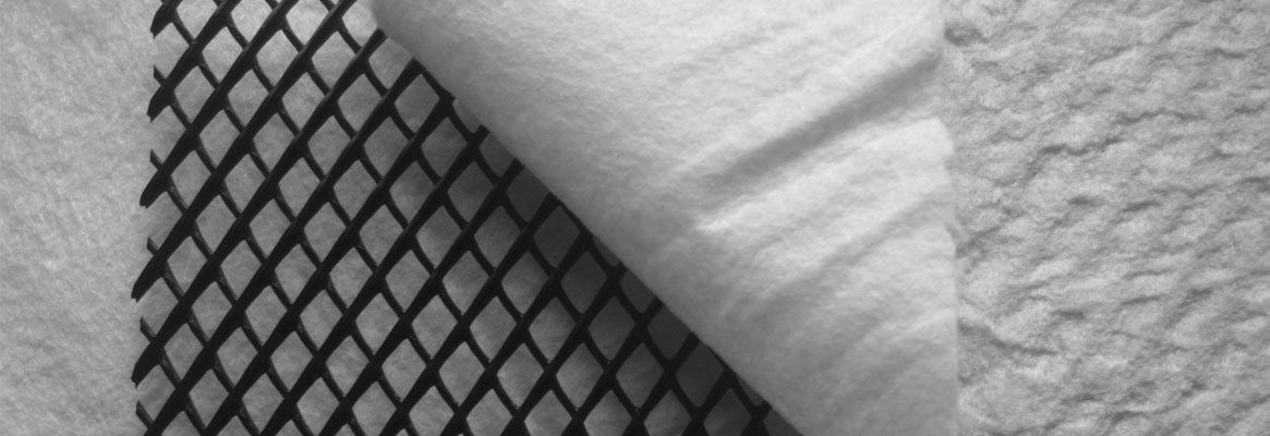 Light-weight nonwoven thermal protection fabrics containing nanostructured materials