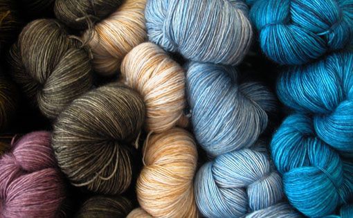 Improving yarn imperfection in polyester cotton blends by