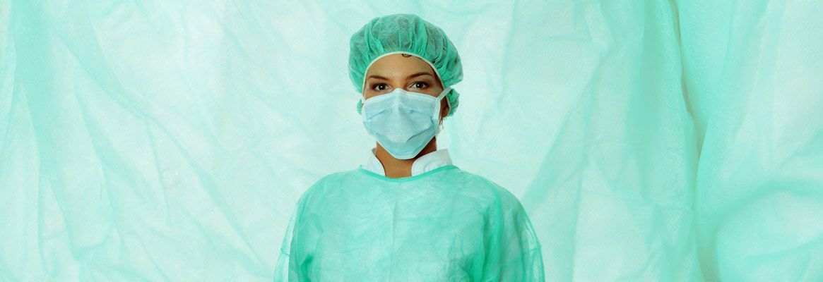 Textile-based personal protective equipment for healthcare personnel