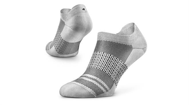 What is the fabric composition of the socks made at Rockay? How different are these from the ones made from virgin fibres?