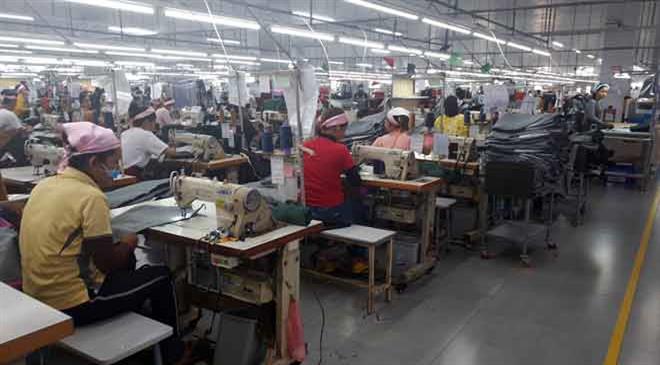 What is the size of the textile industry in Cambodia? What is the workforce that it employs?