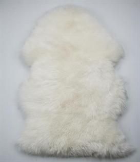 genuine sheepskin , handmade, soft and warm rug