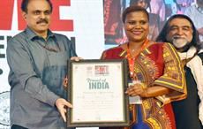 MSME secretary Arun Kumar Panda presenting 'friend of India' plaque to a delegate from Malawi at the first International SME Convention. Courtesy: PIB