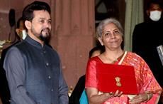 Union Minister for Finance and Corporate Affairs Nirmala Sitharaman along with MoS Anurag Singh Thakur arriving at Parliament House to present the General Budget 2021-22. Pic: PIB