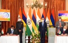 Anup Wadhawan, Commerce Secretary, India, and Haymandoyal Dillum, Secretary of Foreign Affairs, Regional Integration and International Trade, Mauritius, signing the India-Mauritius CECPA. Pic: PIB