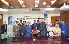 BEPZA Member (Investment Promotion) Ali Reza Mazid and Adnan Fibre MD Adnan Mehmood after signing the MoU. Pic: BEPZA