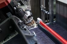 The R9500-2denim is equipped with iSaver, a unique mechatronic device. Pic: Itema