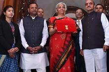 India’s finance minister Nirmala Sitharaman along with ministers of state for finance Pankaj Chaowdhary and Bhagwat Kishanrao Karad arriving at Parliament House to present the Budget 2023-24. Pic: PIB