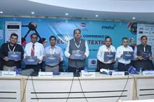 L-R: Mayank Chhatwal, Nandan Kumar, Abhijit Majumdar, Madhu Sudhan Bhageria, Rajeev Saxena, Arindham Basu and RK Vij unveiling Fibre2Fashion’s knowledge paper today in New Delhi. Pic: PHDCCI.