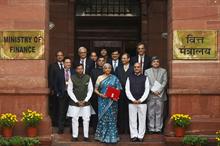 India’s Minister for Finance and Corporate Affairs Nirmala Sitharaman along with Ministers of State for Finance and senior officials before leaving for Parliament on February 1. Pic: PIB