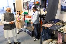 Prime Minister Narendra Modi during a walkthrough of the textile exhibition showcased on the ‘Bharat Tex 2024’ at Bharat Mandapam, in New Delhi on February 26, 2024. Pic: PIB