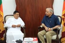 (L) Sri Lanka’s minister of ports, shipping and aviation Nimal Siripala de Silva and Indian High Commissioner to Sri Lanka, Santosh Jha. Pic: News.lk