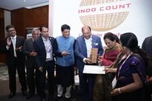 KK Lalpuria, executive director & CEO of Indo Count Industries Ltd, receives award from textiles minister Piyush Goyal and MoS for textiles Darshana Jardosh. Pic: CITI