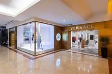 US’ Capri completes $1.375 bn sale of Versace to Prada