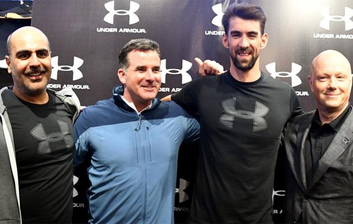 (L-R) Tushar Gokuldas, MD-India; Kevin Plank, Founder & CEO; Michael Phelps; Patrik Frisk, President & Chief Operating Officer; Pic: Under Armour 