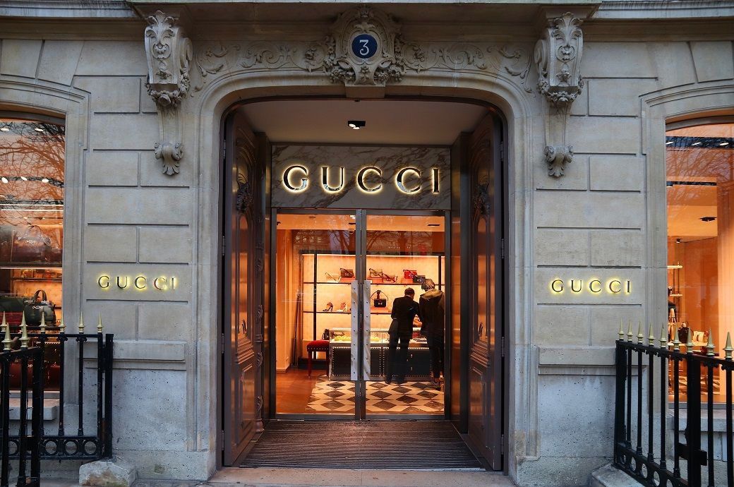 Gucci and Dolce & Gabbana Store Exterior Editorial Stock Image