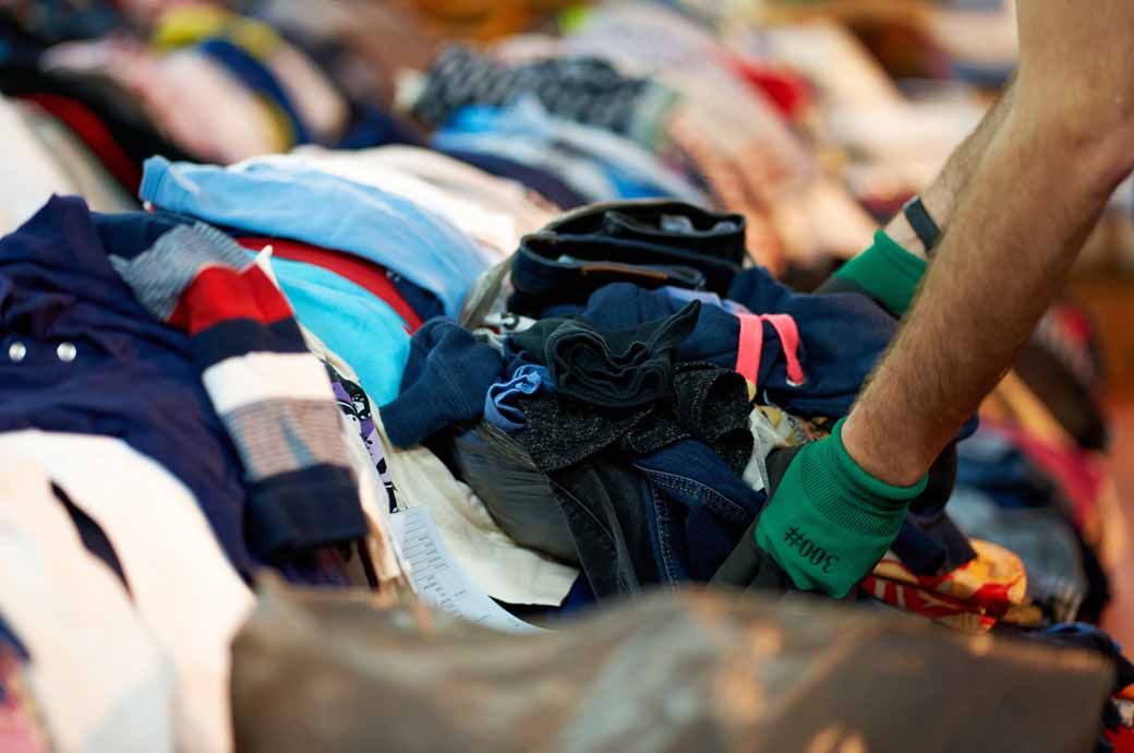 UK's textile recycling crisis: Infrastructure gaps & export challenges