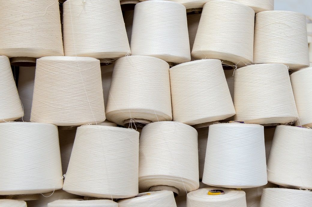 Rupee slide boosts India's yarn exports, local demand still weak