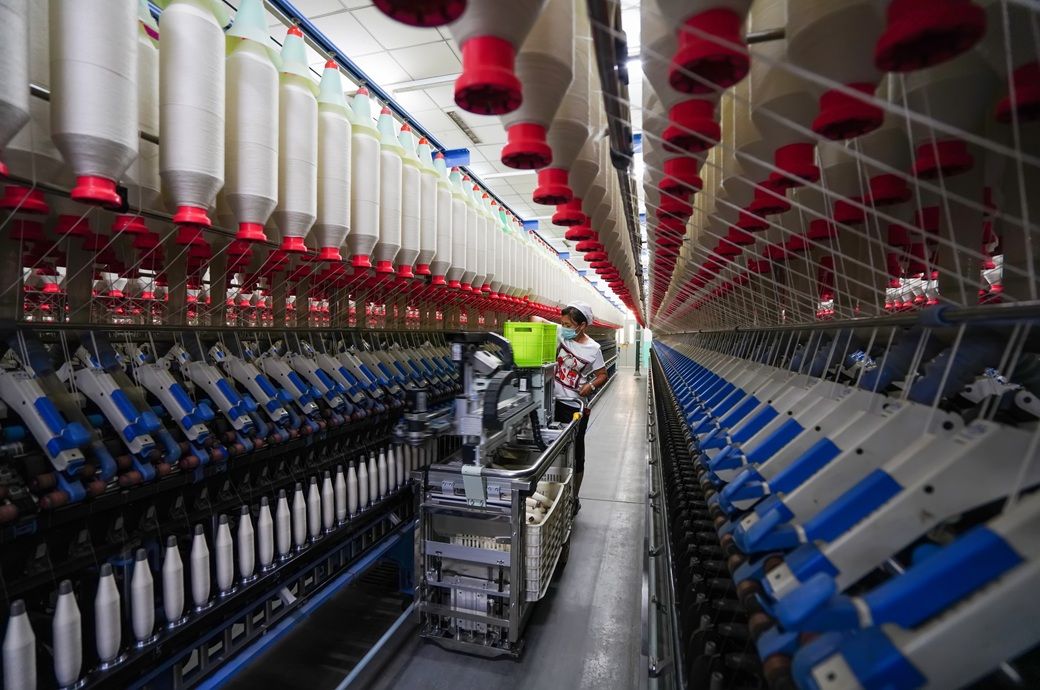 China's manufacturing expands for fourth month in March; growth slows