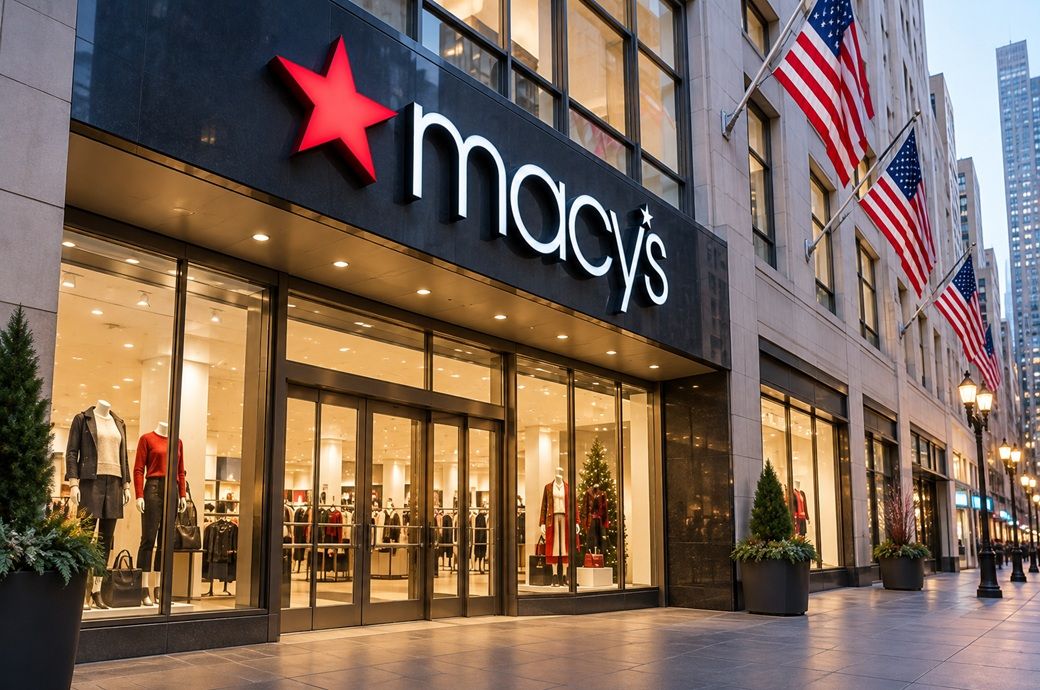 Why did Macy's raise its FY26 outlook?