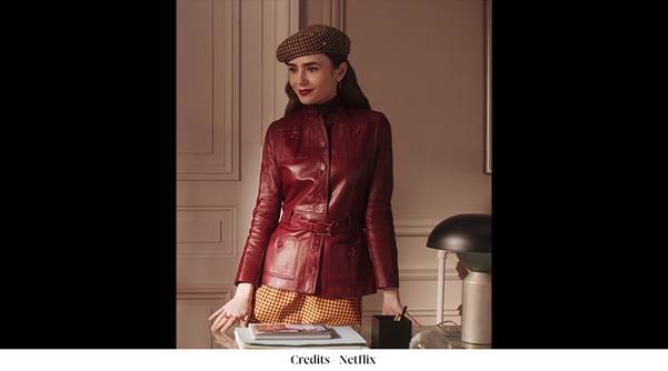 A person in a red leather jacketDescription automatically generated