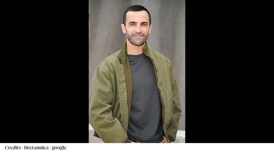 A person in a green jacket
Description automatically generated