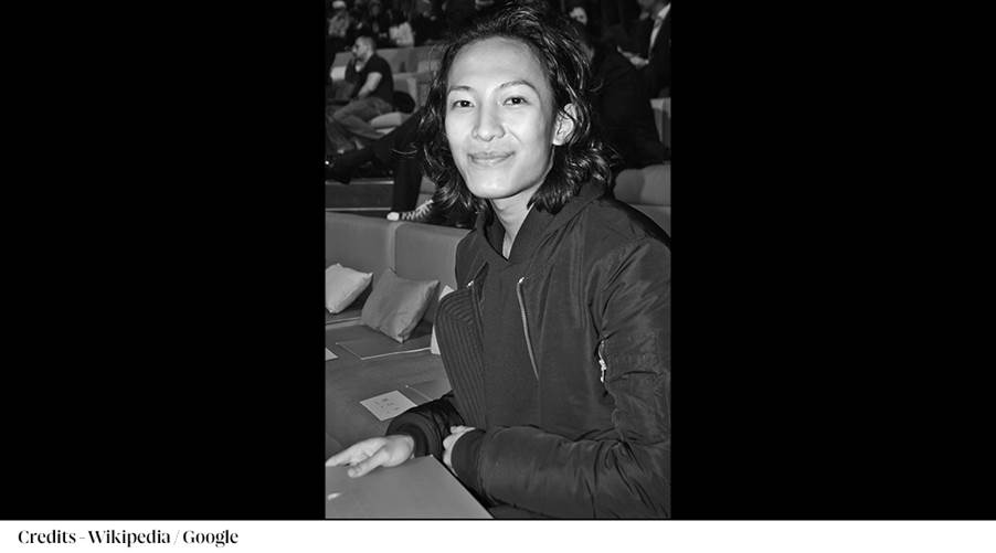 A person smiling at camera
Description automatically generated