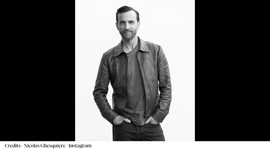 A person in a leather jacket
Description automatically generated