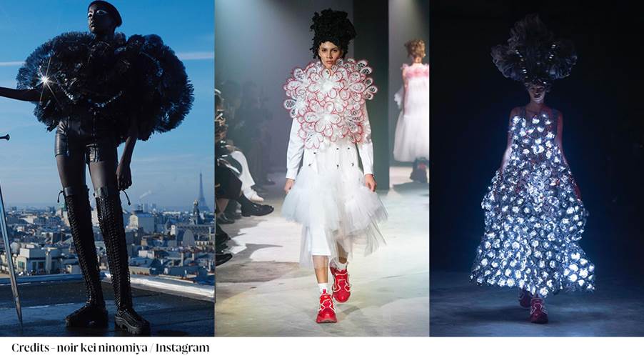 A collage of models walking down the catwalk
Description automatically generated