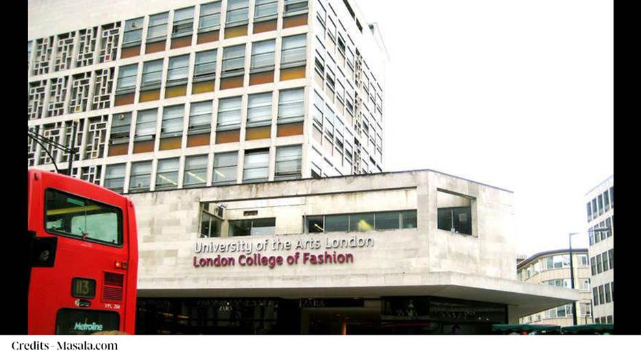 A building with a sign on the side
Description automatically generated