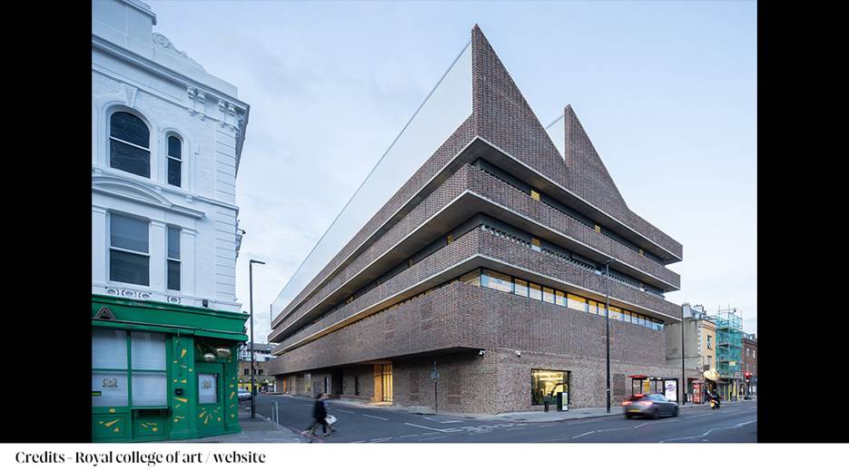 A building with triangular shaped windows
Description automatically generated