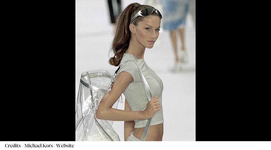 A person wearing a white top and a clear jacket

AI-generated content may be incorrect.