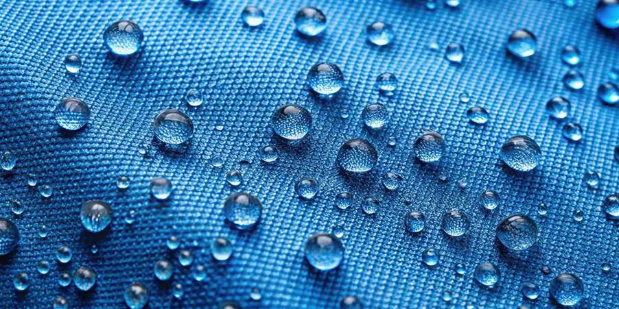 Water droplets on a blue fabric
AI-generated content may be incorrect.