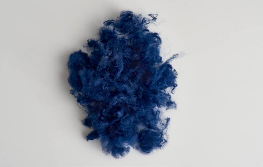 A blue fluffy object on a white background

AI-generated content may be incorrect.