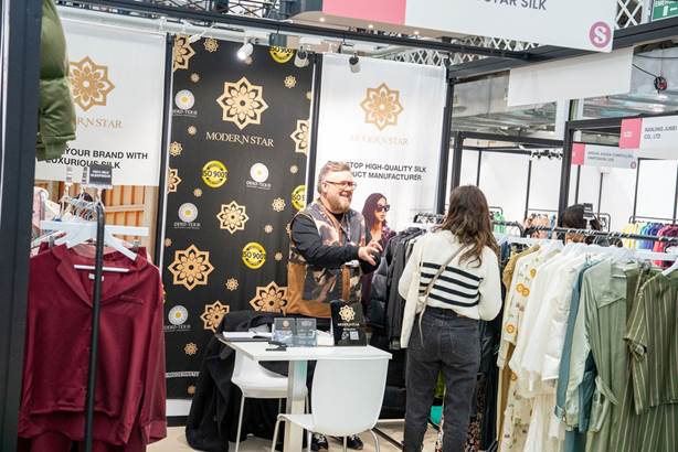 A person standing in front of a store

AI-generated content may be incorrect.