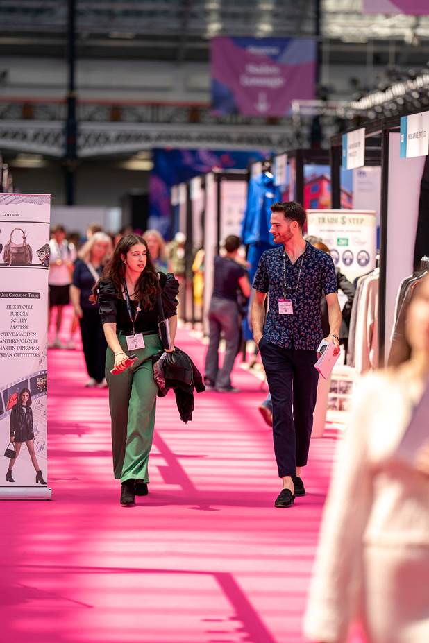 A person and person walking on a red carpet
AI-generated content may be incorrect.