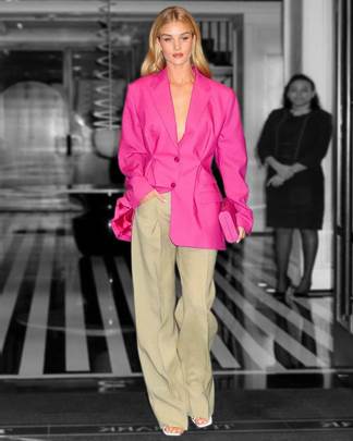 A person in a pink coatDescription automatically generated with medium confidence