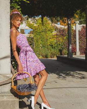 A person in a dressDescription automatically generated with low confidence