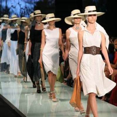 A group of women wearing white dressesDescription automatically generated with medium confidence