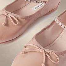 A picture containing footwearDescription automatically generated