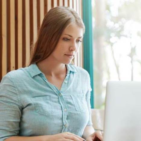 A person sitting in front of a computerDescription automatically generated with low confidence