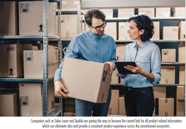 Two people looking at a computerDescription automatically generated with medium confidence