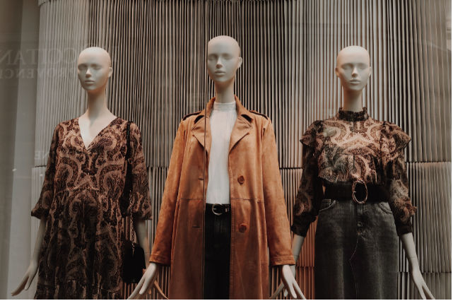 A group of mannequins wearing clothing
Description automatically generated with low confidence