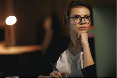 A person holding a pen
Description automatically generated with low confidence