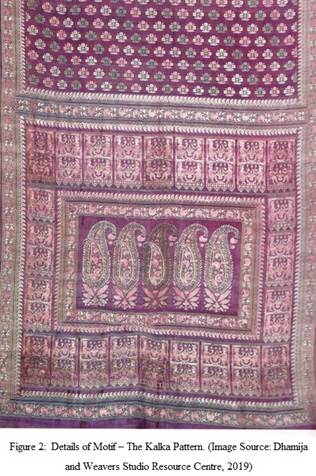 A picture containing text, furniture, rug, fabricDescription automatically generated