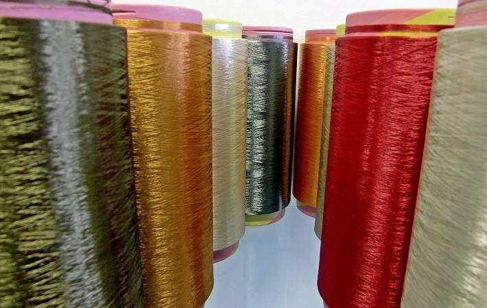Spun-dyed Trevira filament yarns. Courtesy: Trevira