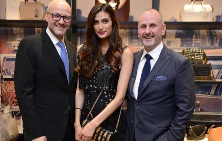  Left to right: Victor Luis, CEO Coach; Athiya Shetty; and Ian Bickley, Coach 1 at Coach store opening. Courtesy: Coach
