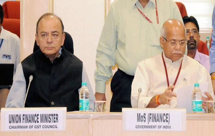 Indian finance minister Arun Jaitley (left) chairing the 22nd GST Council meeting. MoS for finance Shiv Pratap Shukla is also seen. Courtesy: PIB