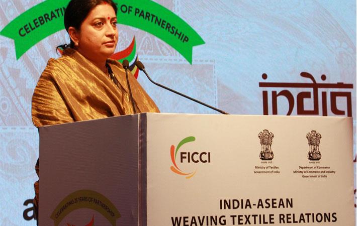 Indian minister for textiels Smriti Irani addressing at the Fabric Show of India-ASEAN Weaving Textiles Relations. Courtesy: PIB